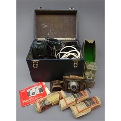  E.Paillard Bolex film projector with three Osram Class A1 lamps in hard carry case, a Eumig electric R cine camera with instructions in case and a Braun Paxette camera with instructions in leather case (3)    