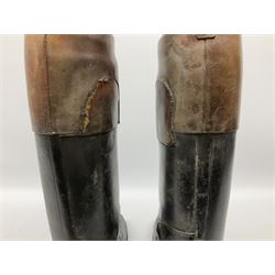 Pair of vintage gentleman's black leather calf length riding boots with brown leather banding and wooden trees, boot H49cm