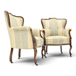 Edwardian mahogany three-piece salon suite, comprising settee and two armchairs, shaped frames with upholstered backs, scrolled arm supports and serpentine seat rails, upholstered in striped floral damask fabric, on cabriole supports with castors (Armchairs: H 96cm, W 70cm, D 68cm)