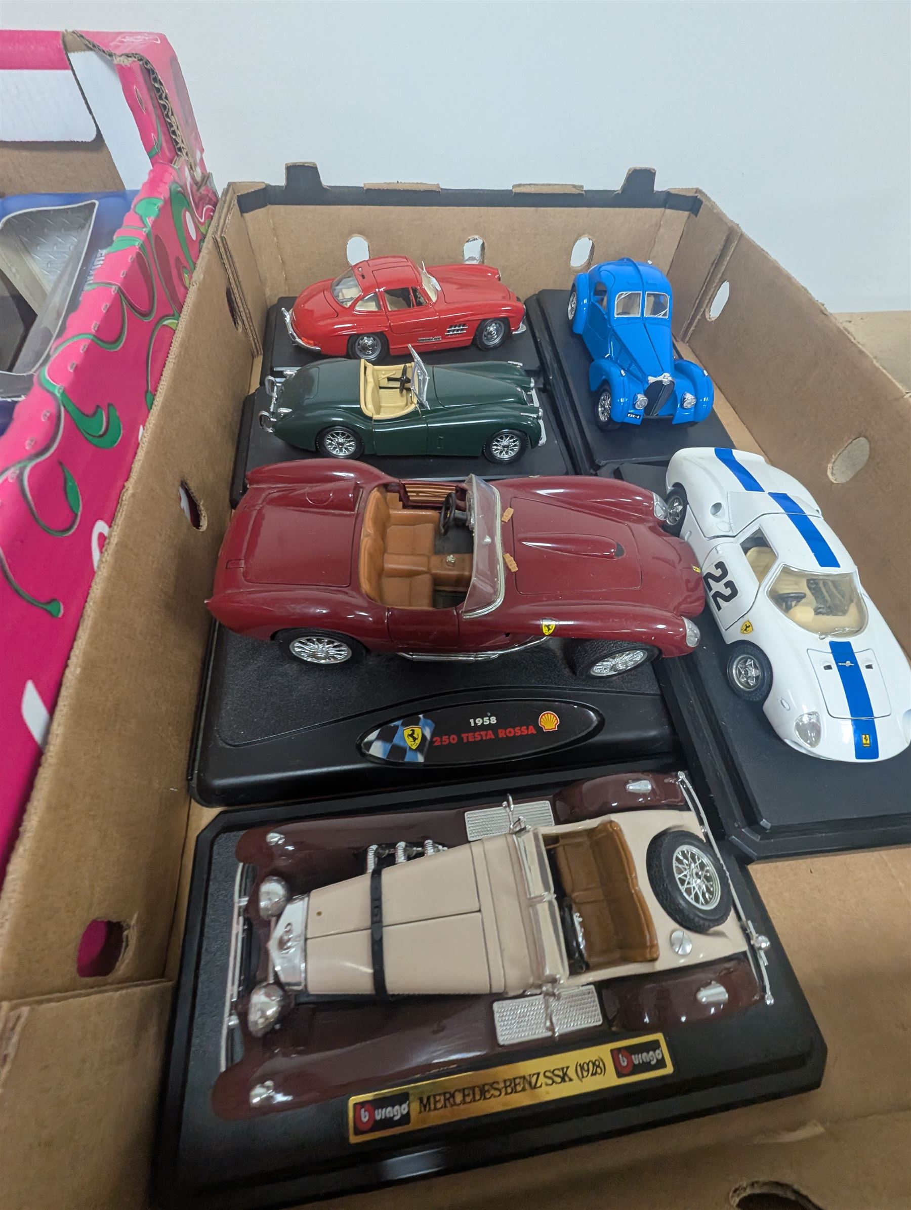 Diecast model vehicles, including Maisto, Majorette and Bburago examples, three boxed the rest loose, different scales, in three boxes