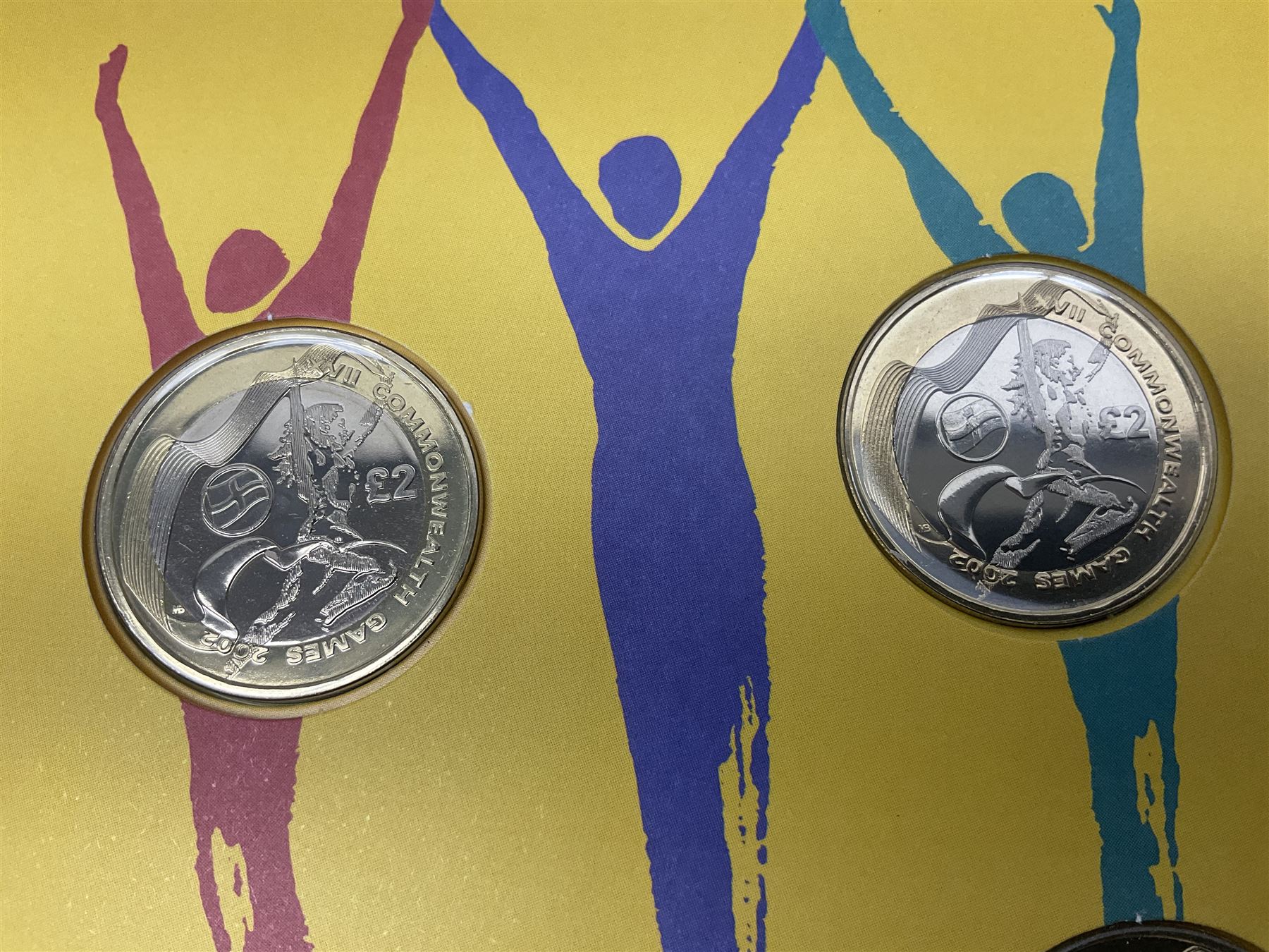 The Royal Mint Queen Elizabeth II 2002 Manchester Commonwealth Games four coin two pound coin cover