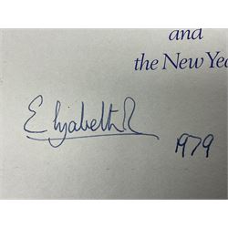 H.M. Queen Elizabeth II and HRH The Duke of Edinburgh, signed 1979 Christmas card with twin gilt ciphers to cover, colour photographic print of the Royal family standing in a garden, signed ‘Elizabeth R and Philip’ with manuscript date 1979 below