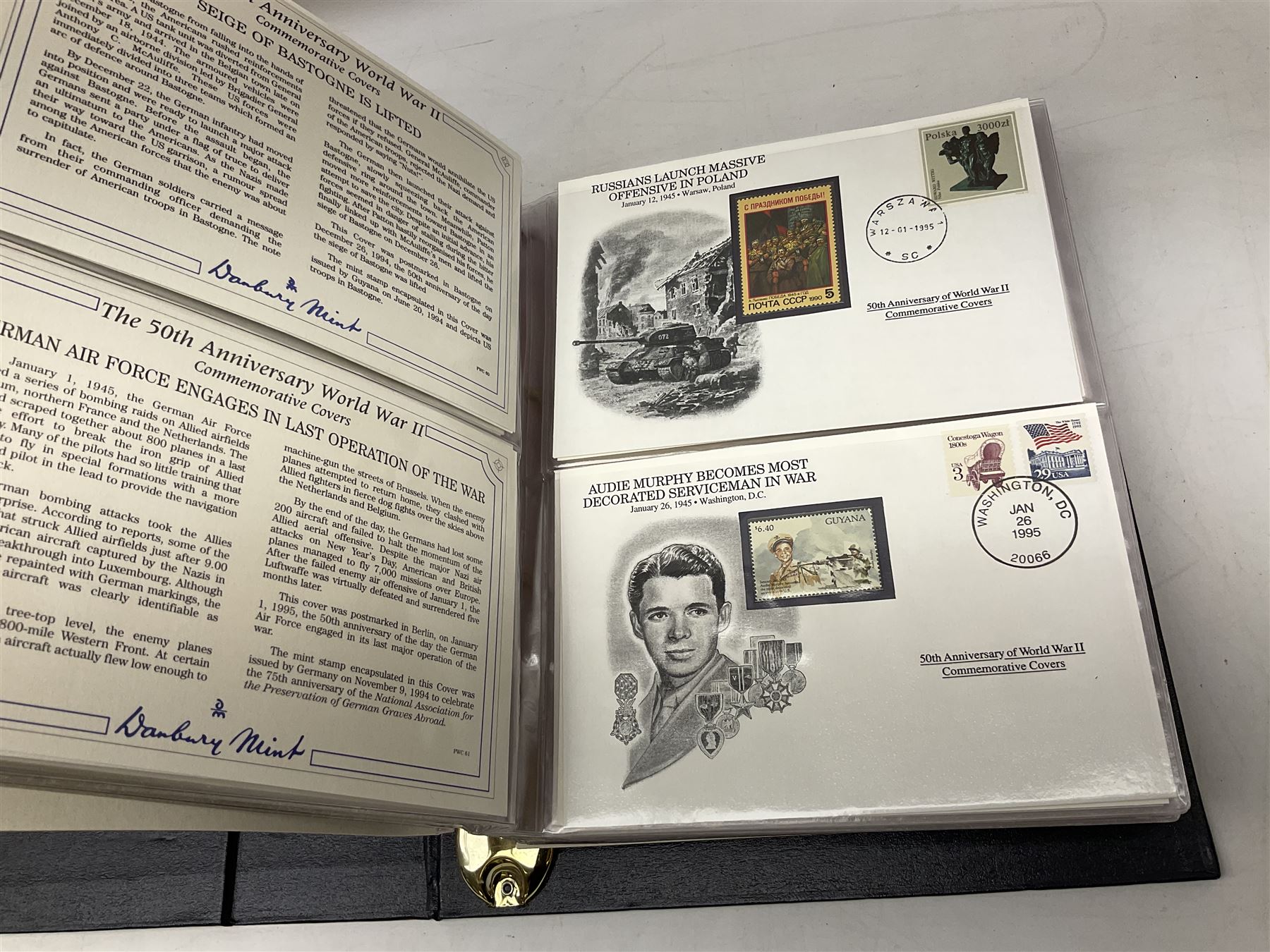 Three albums of 'The 50th Anniversary World War II Commemorative Covers Collection', housed in the official Danbury Mint folders