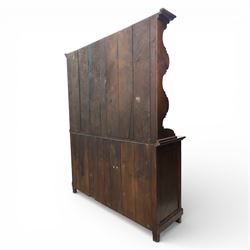 Georgian design oak dresser, the raised plate rack with shaped sides and two open shelves, upon a dresser base fitted with six drawers and two cupboard doors, and short block feet 