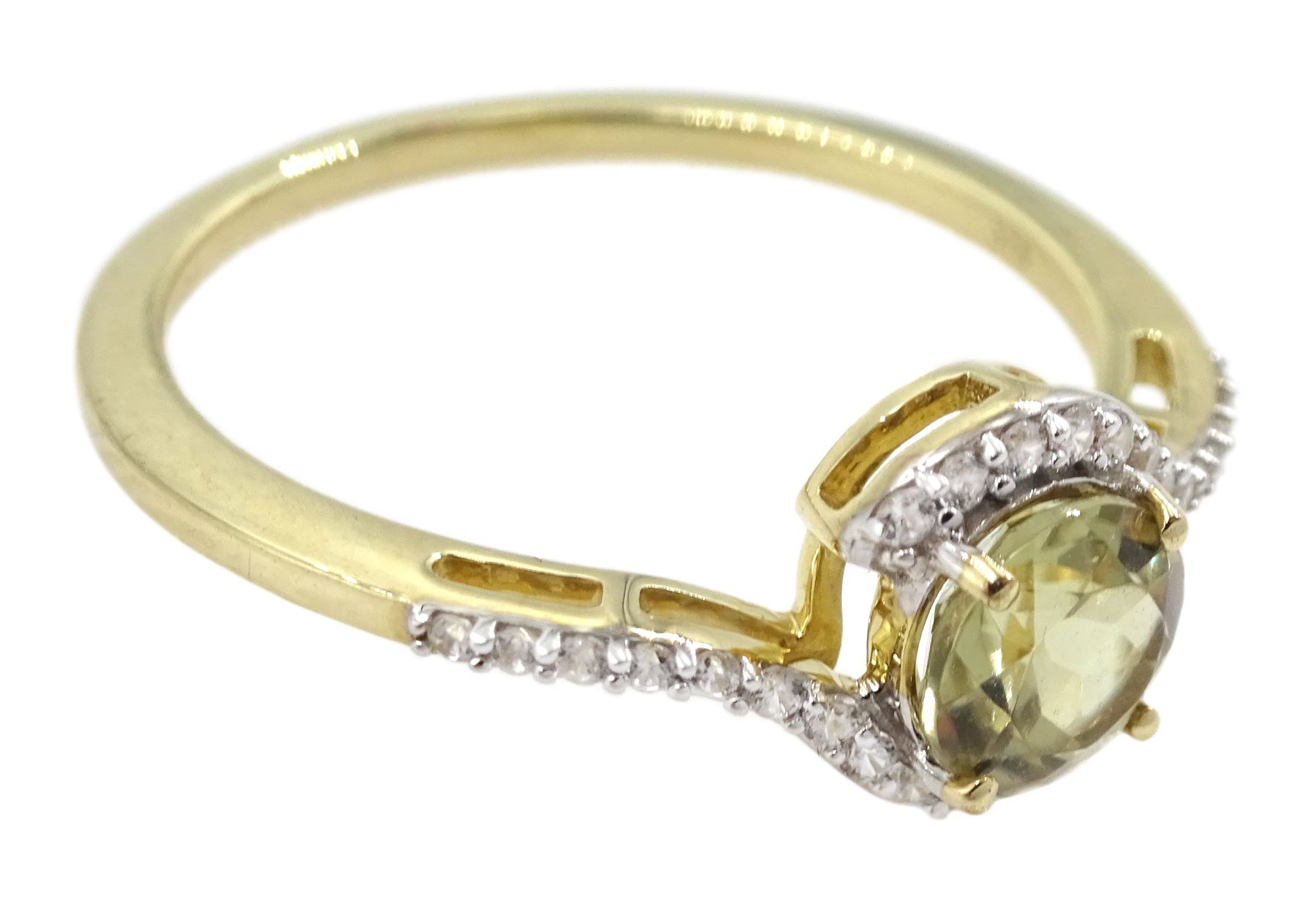 9ct gold csarite and white zircon crossover ring, hallmarked 