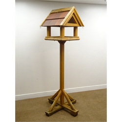 Timber bird table, with tiled rood, H198cm  