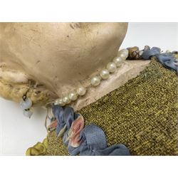 Victorian large wax over composition Pumpkin head doll, with inset dark glass eyes, moulded blonde hair in curls, stuffed body with carved and painted wooden limbs, grey painted boots, floral satin dress with netting underclothes H61cm