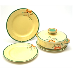 A Clarice Cliff Bizarre by Wilkinson/Newport Pottery vegetable tureen and cover, dinner plate and two dessert plates in the Ravel pattern. (4).