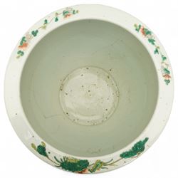 19th century Chinese famille jaune jardiniere decorated with trailing flowers and leaves on a yellow ground H34cm x 40cm