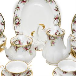 Royal Albert Celebration pattern tea and dinner wares, comprising covered tea and coffee pot, seven dinner plates, oval serving dish, gravy boat and saucer, nine coffee cups and ten coffee cup saucers, seven teacups and eight teacup saucers, eight soup bowls and saucers, rectangular serving tray, ten side plates, etc, approximately 88 pieces in total