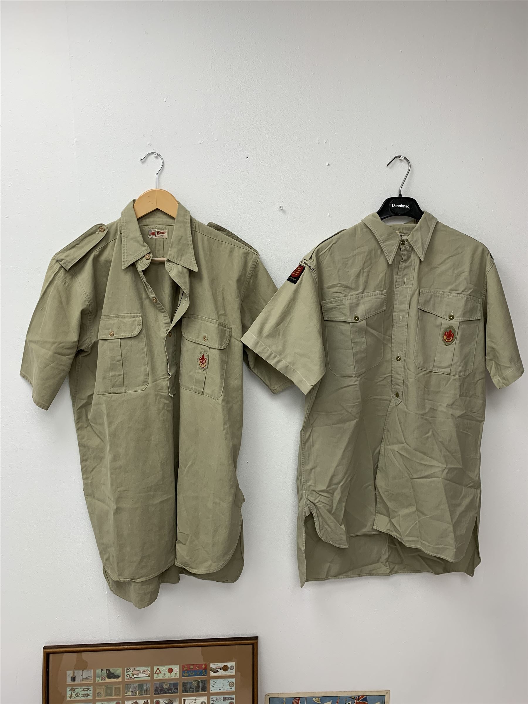 Mid 20th century Boy Scouts uniform, comprising corduroy shorts, further pair of shorts, two shirts, socks, and felt hat, together a framed collection of Ogden's 'Boy Scots' cigarette cards, and an unframed print of Lord Baden Powell. 