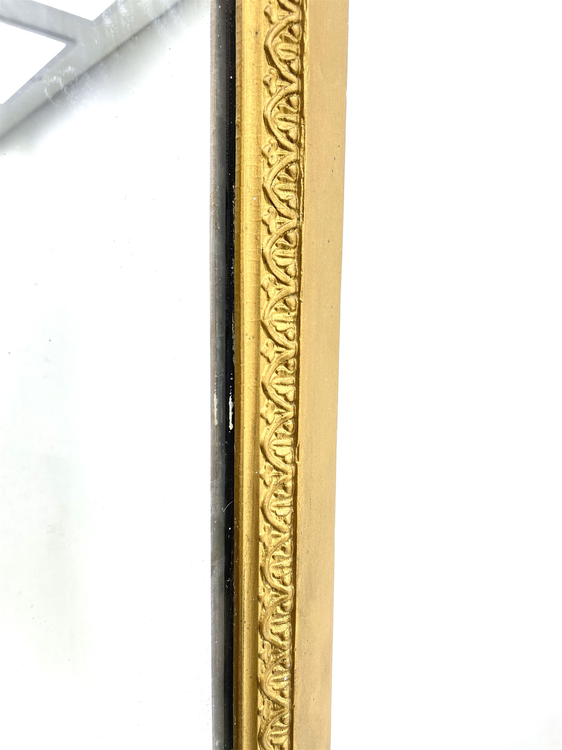 Tall Victorian hall mirror, in arched gilt frame with foliate mould slip, acanthus scroll corner brackets 