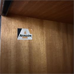 Avalon - modular teak wall unit, with black metal supports, fitted with cupboards, drawers, and adjustable shelves, corner configuration