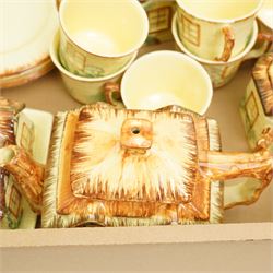 Keele St. Pottery cottage tea set comprising seven cups, six saucers, six plates, large and small teapots, butter dish, two milk jugs and two sugar bowls and covers