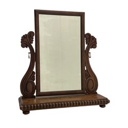 William IV mahogany dressing table mirror, scrolled uprights supporting rectangular swing mirror, rectangular base with applied lobed moulding, on compressed bun feet 