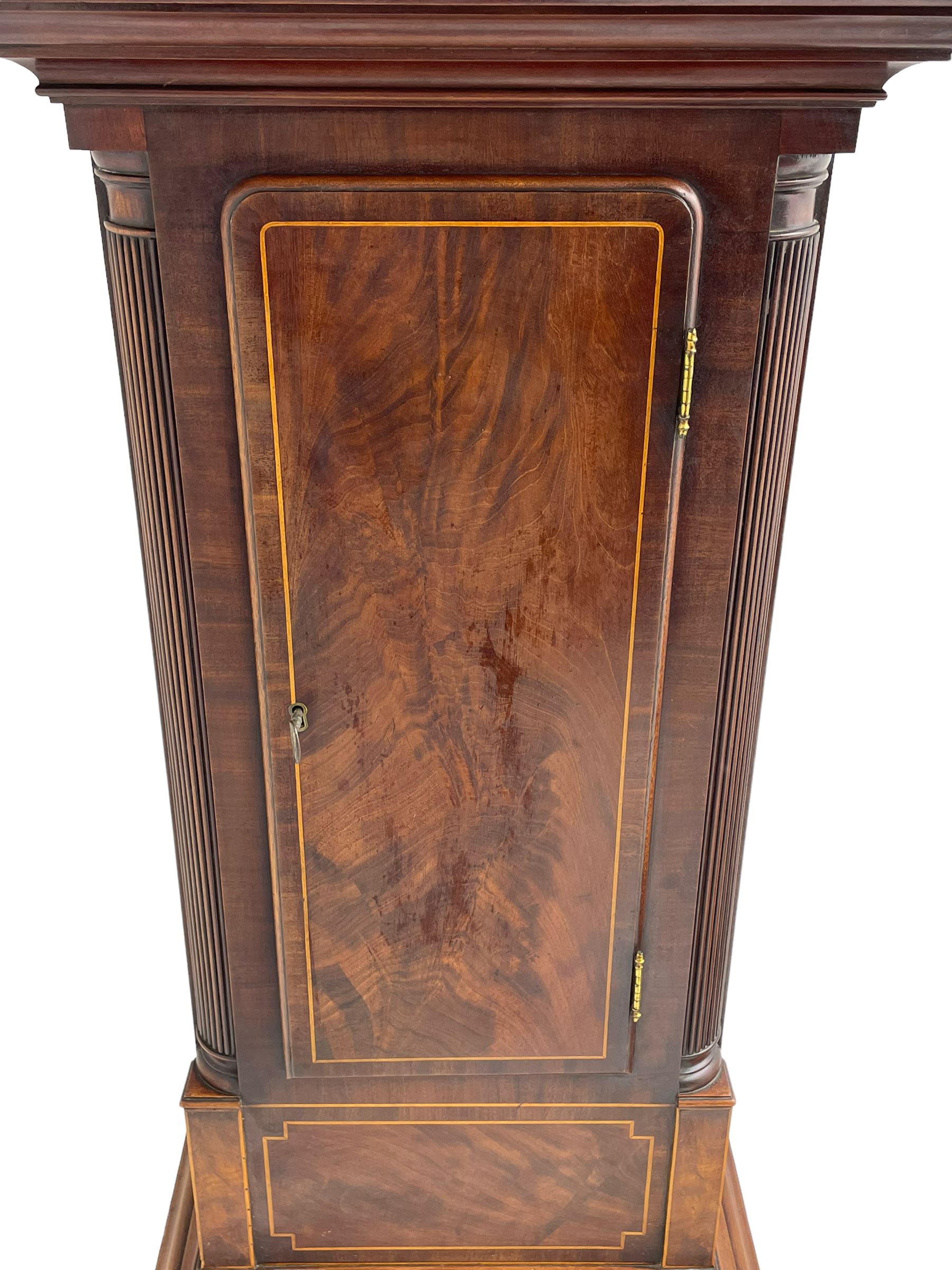 Samuel Ritchie of Forfar - William IV 8-day Scottish longcase clock in a mahogany case, with a swans neck pediment, brass paterae and three ball and spire brass finials, case and trunk inlaid with satinwood stringing on a plinth raised on decorative bracket feet, painted break arch dial depicting a costal scene to the break arch and conch seashells to the spandrels, Roman numerals, subsidiary seconds and date dials with matching steel hands, with a rack striking movement striking the hours on a bell. With weights, key, and pendulum.  Samuel Ritchie is recorded as working in Forfar 1800-37.