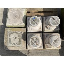 Set of four cast stone architectural columns, tapering form, on square plinth bases