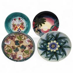 Moorcroft limited edition Birth of Light pattern millennium year plate, numbered 699/2000, impressed and painted marks to base; together with three other year plates comprising 1998, 1992 and Spitalfields Temple Mills edition 1991 plate (4)