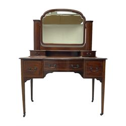 Edwardian inlaid mahogany dressing table, raised swing mirror back over two trinket drawers, base fitted with three drawers, raised on square tapering supports