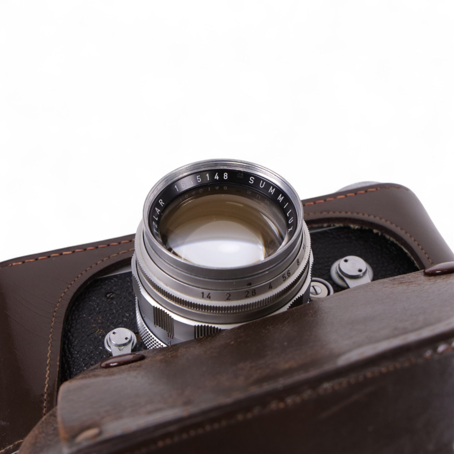 Leica DBP M3 35mm rangefinder camera body, serial no. 1038356, circa 1961, in chrome finish, housed in brown leather Leica case, with a Leitz Wetzlar Sunnilux 1:1.4/50 lens serial no. 1845148, Leitz Wetzlar Elmar 1:4/135 lens serial no. 1825980, 12575N hood, 12521G hood, Leica Meter MC serial no. 99015, Sunpak Auto28 SR Thyristor, Linhof 3 Way Pan tripod, and a Toshiba PE-1 Linear Exposure meter, all housed in an Original Benser Everready Case, most items with instruction booklets 