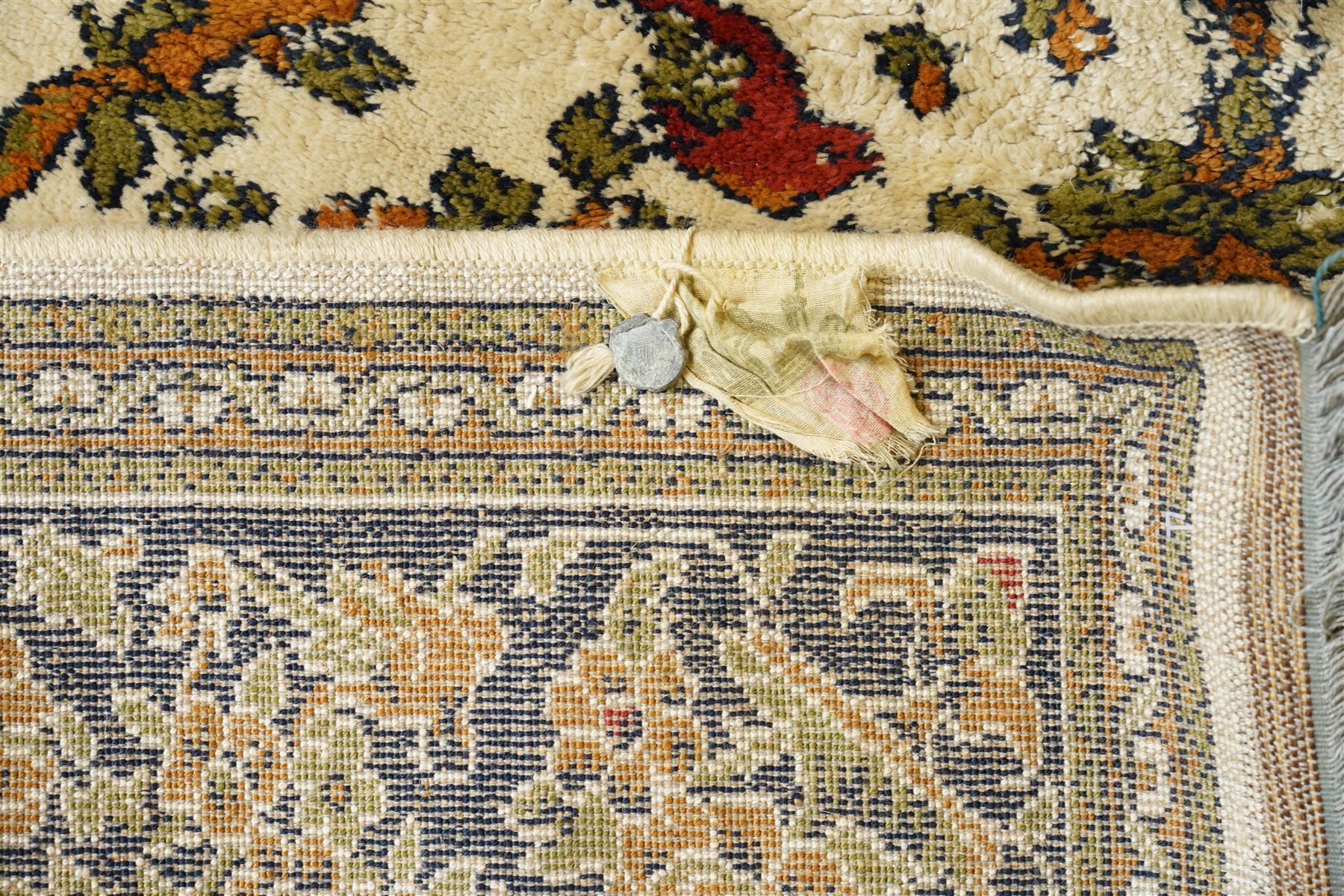 Kashan style rug, twin peacocks flanking a large decorative urn, motifs tree of life style, multiple borders with fine floral patterns 