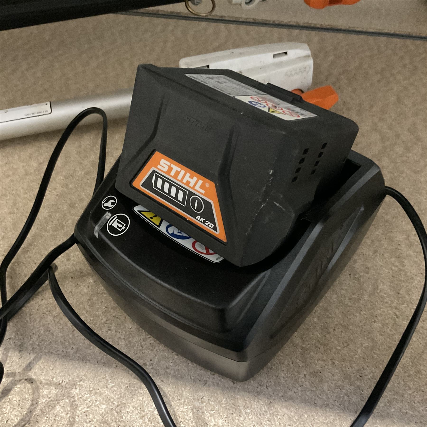 STIHL HLA 56 cordless longreach hedge trimmer with two batteries and