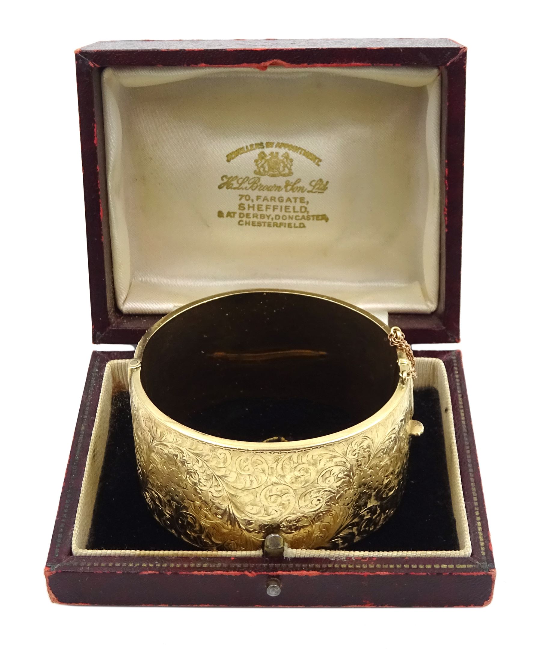 9ct gold wide hinged bangle, with bright cut foliate decoration, by Smith & Pepper Ltd, Birmingham 1963, boxed