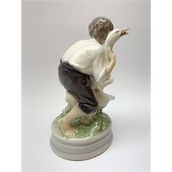 A Royal Copenhagen figure modelled as a boy and two geese, model no 2139, H17cm.