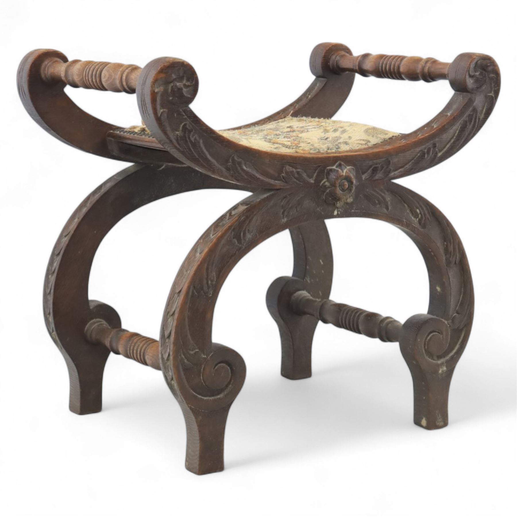 Late 19th century carved oak X-frame stool with tapestry seat