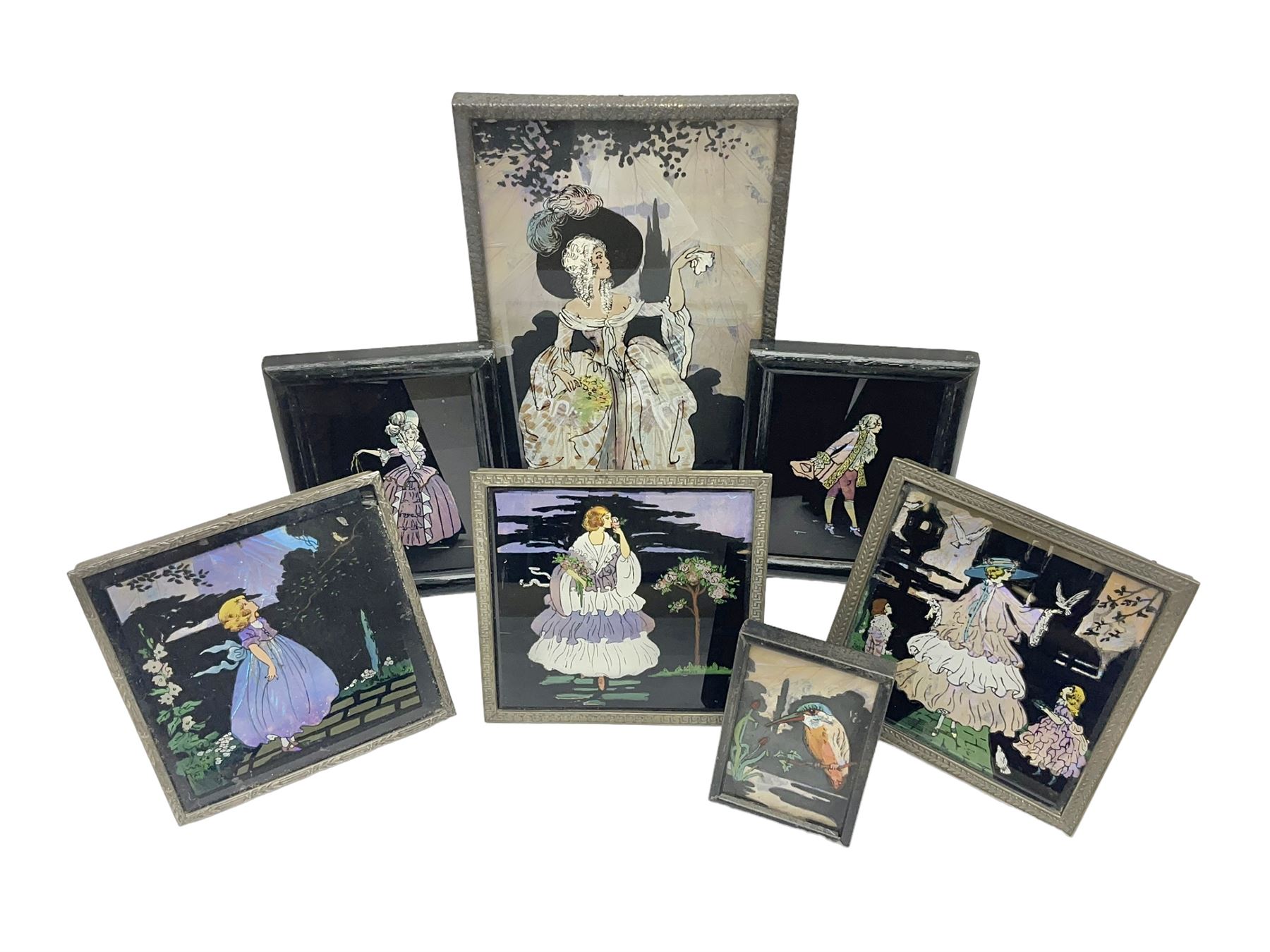 Seven 1930's butterfly wing pictures, mainly of ladies in period dress, one signed Dorothy Buckley, largest H18cm