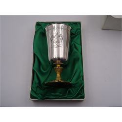 Modern limited edition silver goblet to commemorate the 350th anniversary of the Act of Parliament founding the Company of Cutlers, the tapering cylindrical bowl engraved with crest, with gilt interior and upon parcel gilt textured knopped stem and pierced circular foot, hallmarked James Dixon & Sons, Sheffield 1974, number 21/210 , in original fitted box with paperwork