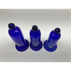 Set of three graduating hand blown blue glass smoke bells, tallest example H18cm 