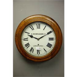  Early 20th century circular oak case wall clock, white dial signed 'A. Brown & Sons LTD, London & Hull, D41cm  