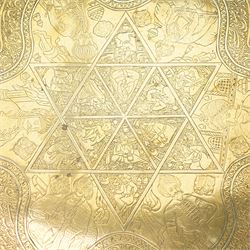 Middle Eastern brass tray, decorated with panels of Maharajas, bordered with repeating patterns, symbols and script, D39cm 