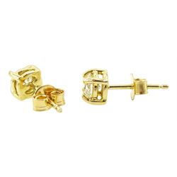 Pair of 18ct gold single stone round brilliant cut diamond stud earrings, total diamond weight approx 0.65 carat