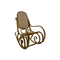 Early to mid-20th century Michael Thonet design bentwood rocking chair, with cane seat and back