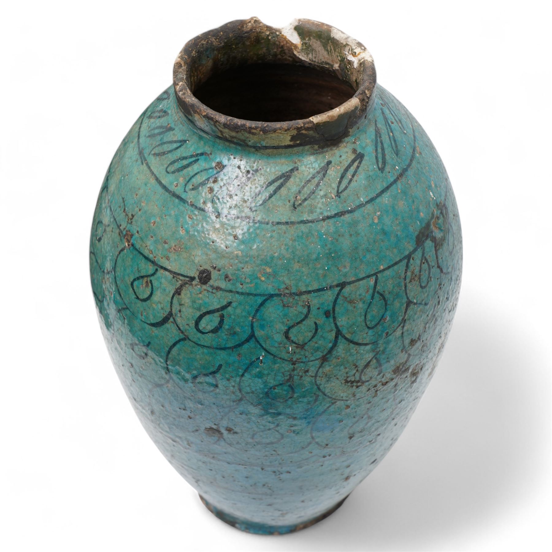 12th to 13th century impressive Persian Kashan fritware or stonepaste pottery storage jar or vase of ovoid form, decorated in dark indigo under a turquoise glaze with a series of horizontal lines and repeating looped shapes to the body, on everted footed base, H39cm
Provenance: this vase was reputedly unearthed in the late 19th century in Egypt by Lord William Amherst (1835-1909), an English diplomat, colonial administrator, antiquarian collector and patron of excavations in Egypt. Lord Amherst is best known for his close association with Howard Carter, the archaeologist who later uncovered the tomb of Tutankhamun. The Kashan vase was then passed down through direct family descent via Amherst's daughter, Geraldine, to the current vendor.