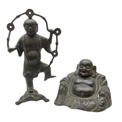 Cast iron figure of Liu Hai, the Chinese God of Wealth modelled standing with one foot upon mythical three-legged chánchú toad and holding a string of Chinese coins, H21cm, together with a cast iron figure of a seated laughing Buddha