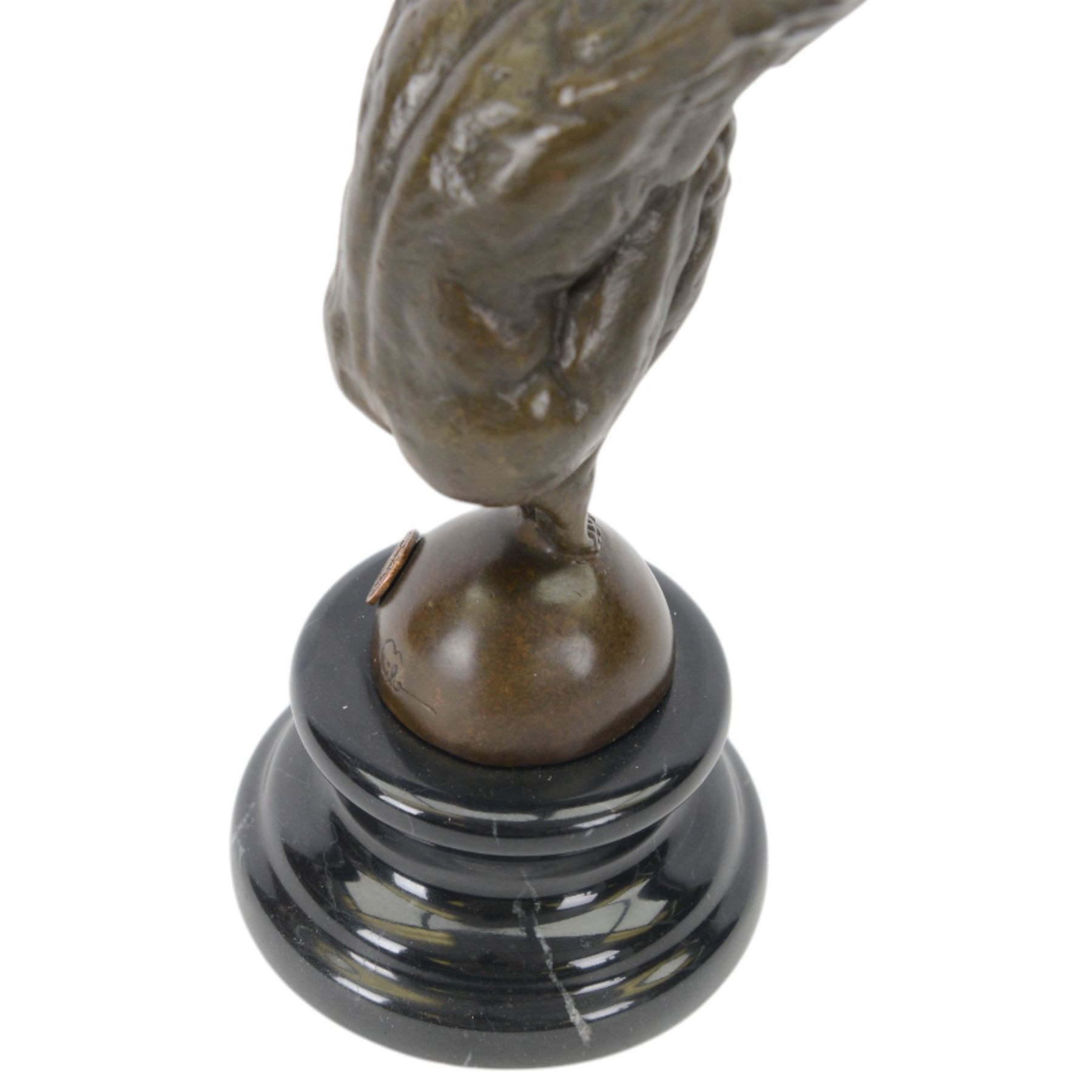 Bronze figure, modelled as a diver with hands raised upon a stepped circular base, H28cm