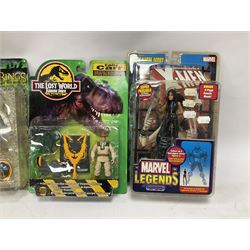 Fourteen carded action figures comprising Toy Story, X-Men Marvel Legends, Lord of the Rings, The Lost World Jurassic Park (2), The Secret Saturdays, Wallace & Gromit, Corgi Tom & Jerry (4), Flintstones, Lost in Space and Disney Infinity Cars; all in unopened blister packs; together with two boxed Robocop figures and carded James Bond car (17)