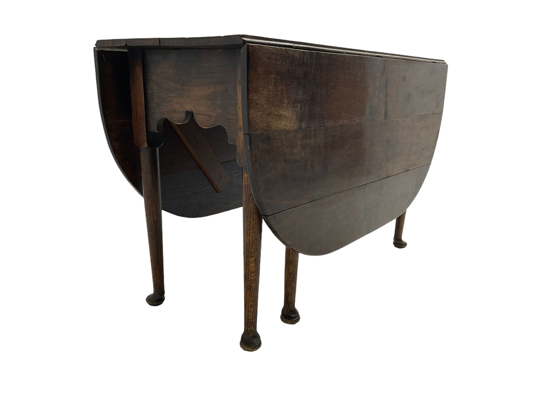 George III oak drop-leaf dining table, oval top over gate-leg action cabriole supports