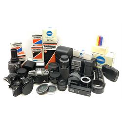 Minolta X700 camera body and Minolta XGM camera body, Tamron 'SP 60-300mm f3.8-5.4' lens, Tamron 'SP 35-80mm f2.8-3.8' lens', Tamron 'SP 500mm 1:8' CF tele macro catadioptric lens and various accessories including filters, tele-converter, flash etc