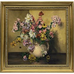Ada Lockwood Bunce (British exh.1937-1940): Still Life Jug of Flowers, oil on canvas signed and dated 1945, labels verso 45cm x 47cm 