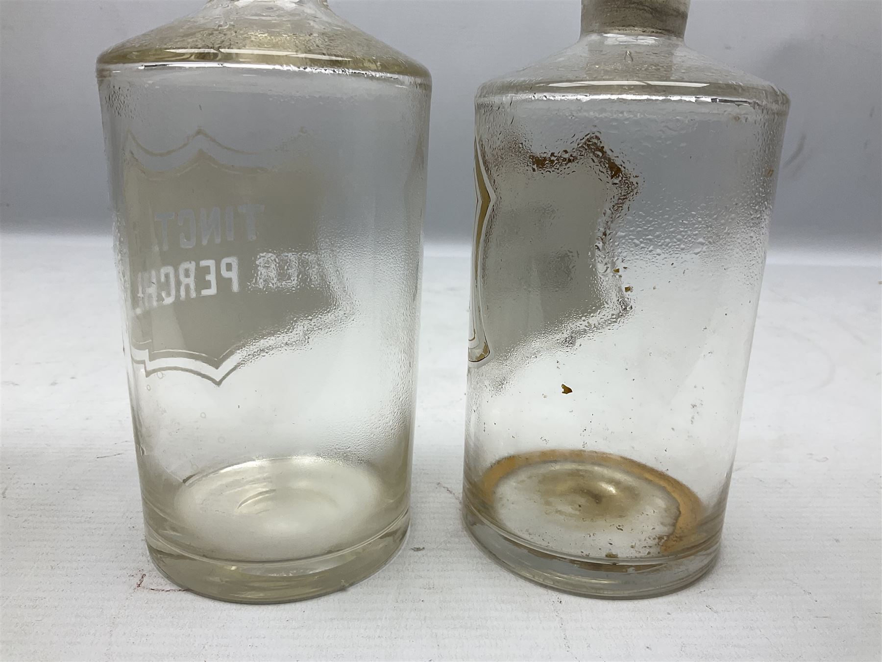 Three Victorian apothecary chemist bottles complete with labels and glass stoppers, H22cm