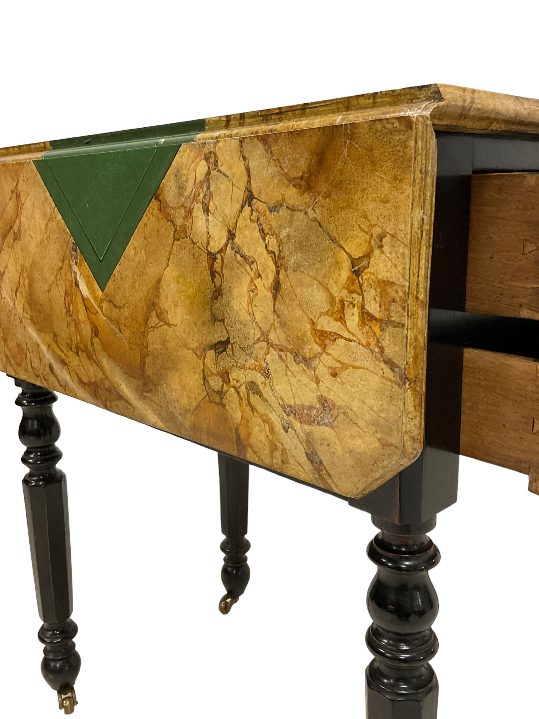 Victorian ebonised drop-leaf pot cupboard with later trompe l'oeil painted top, depicting marbled surface with baize cloth, playing cards and pencil, fitted with two drawers to one end and cupboard to the other with marble inset, on turned and faceted supports with brass castors
