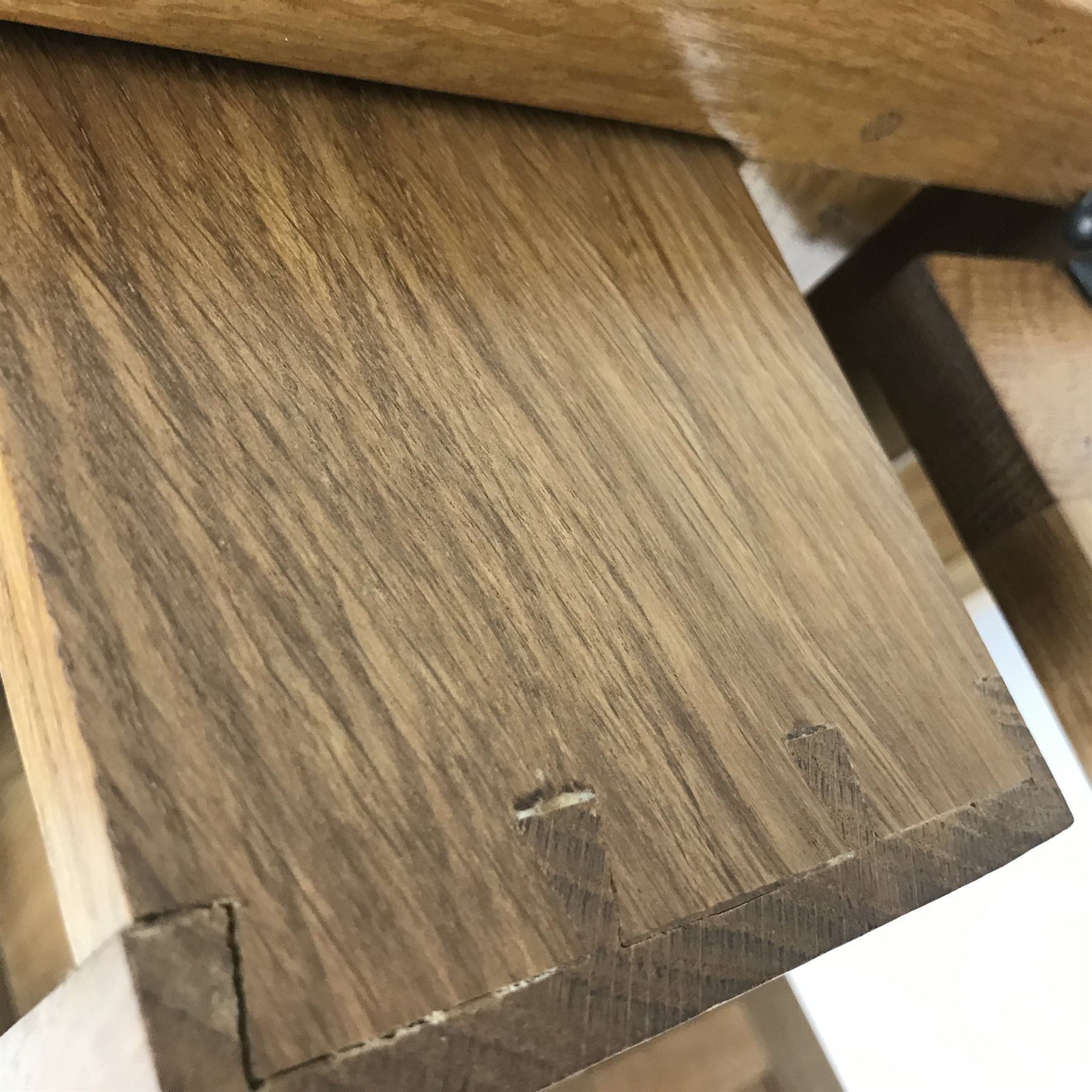 'Lizardman' panelled oak dresser, two heights plate rack above base fitted with three drawers, double cupboard and two single cupboards, by Derek Slater of Crayke, W181cm, H167cm, D45cm