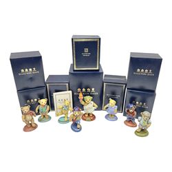 Eight Halcyon Days Teddy Bear of the Year figures, from 1993 to 2000, including one example modelled as a bear in Greek dress carrying a torch, one example modelled as a schoolboy and one example in a blue dress, all boxed 