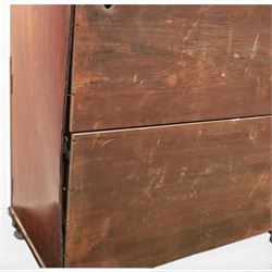 Early 19th century mahogany secretaire-bookcase, projecting cornice above astragal glazed cabinet with adjustable shelved interior, fall front secretaire drawer, fitted interior with pigeonholes and drawers, flame mahogany fronted cabinet with three drawers, on turned supports 