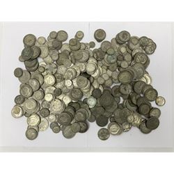 Approximately 2702 grams of Great British pre 1947 silver coins