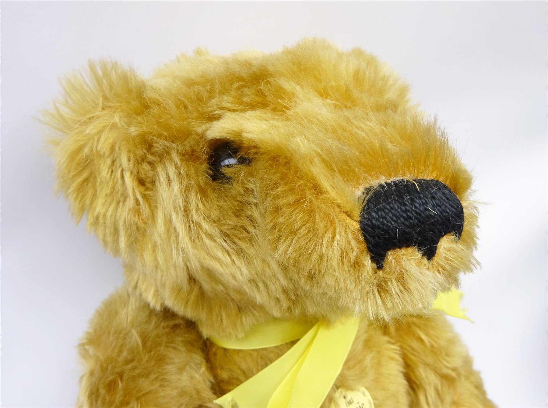 Steiff Replica 1903 Classic teddy bear, the golden mohair body with press squeaker and card tag No.000201 H21